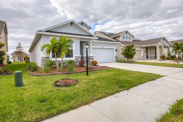 view of front of house with a garage and a front yard