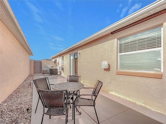 view of patio with central AC