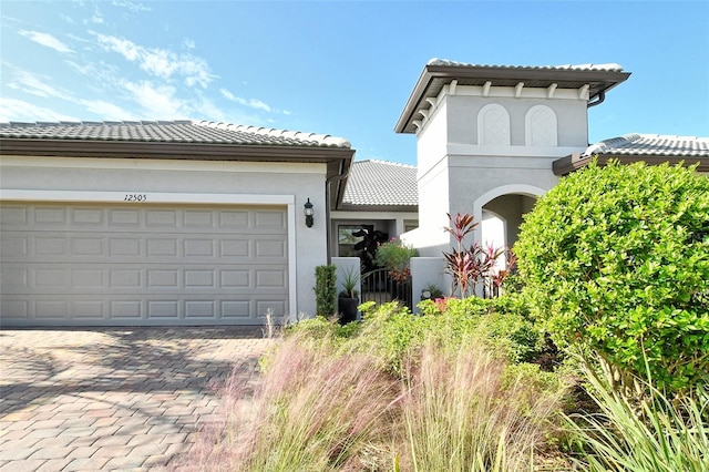 view of front of property featuring a garage