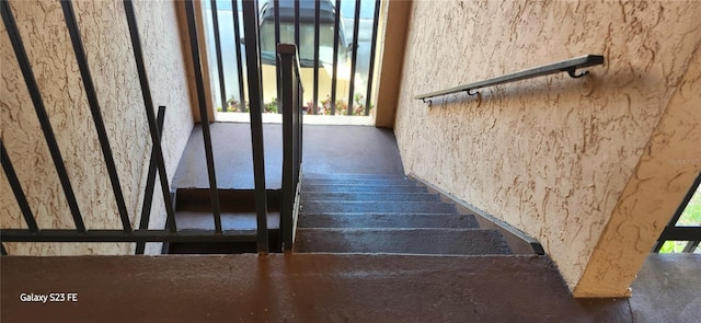 staircase with a healthy amount of sunlight