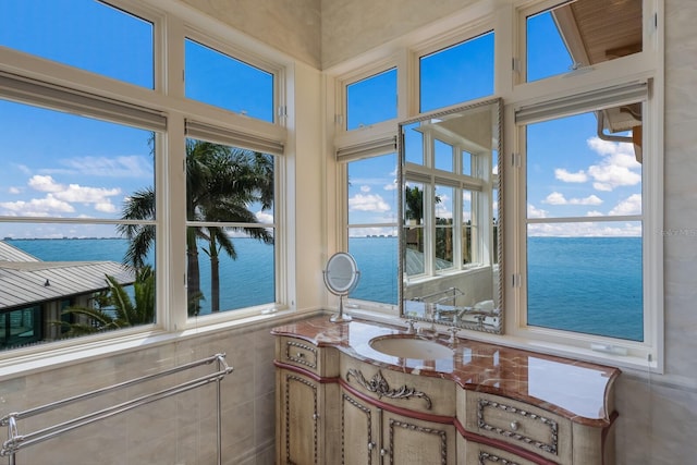 309 Ringling Point Dr, Sarasota, FL 34234 - bathroom featuring a water view and plenty of natural light