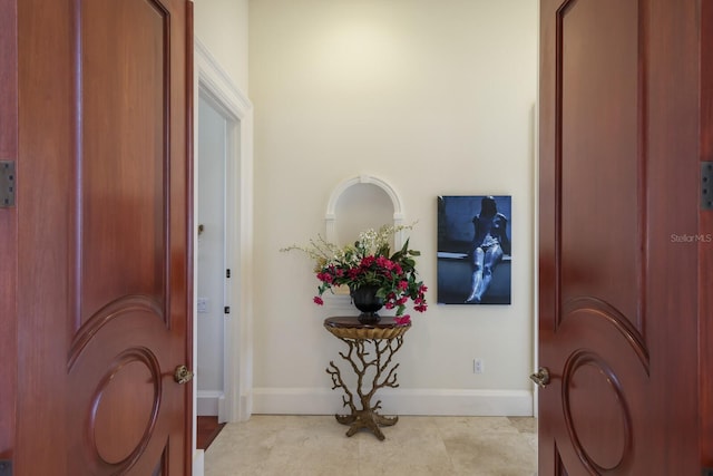 entrance foyer with light tile patterned floors