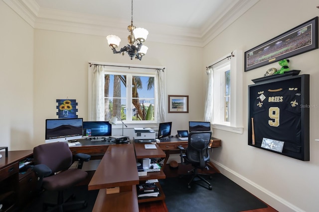 office with ornamental molding and a notable chandelier