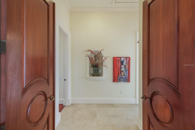 corridor featuring crown molding and light tile patterned flooring