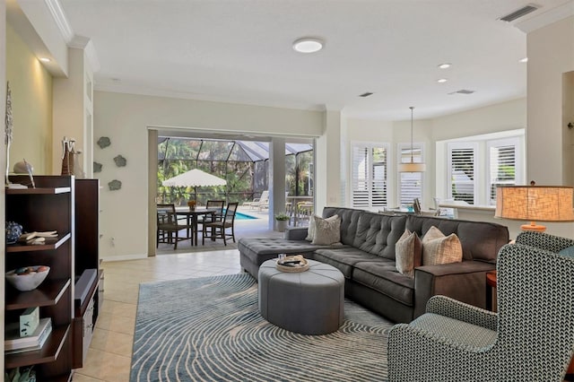 living room featuring light tile patterned floors and ornamental molding