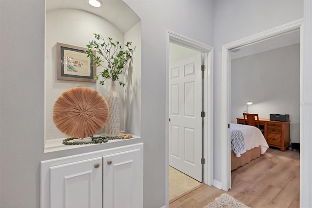 bedroom with light wood-type flooring