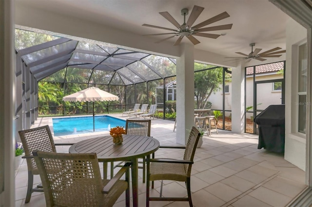 view of pool featuring a patio area, a lanai, and a grill