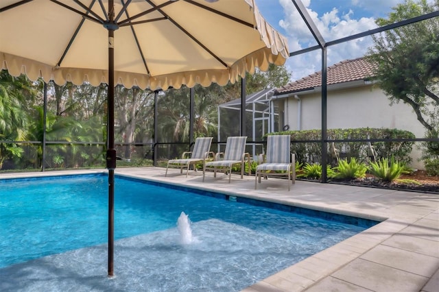 view of swimming pool with a patio area