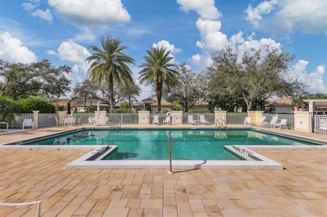 view of pool featuring a patio area