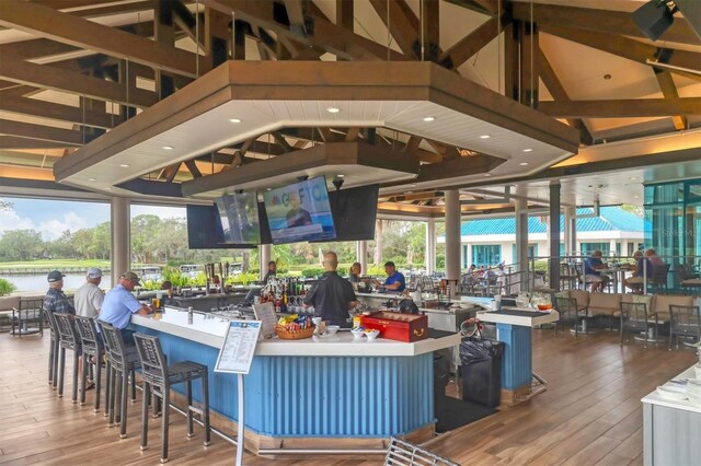 interior space featuring a gazebo, a deck, and an outdoor bar