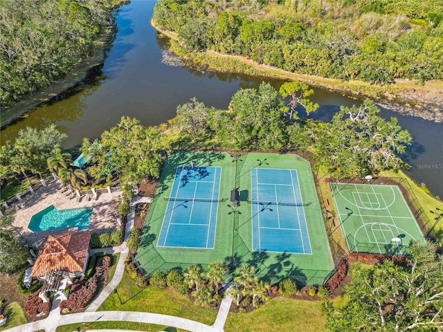 birds eye view of property featuring a water view