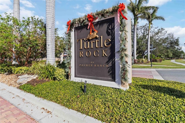 view of community sign