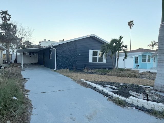 view of front of property with a carport