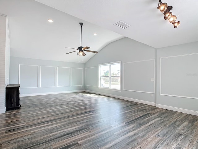 unfurnished living room featuring vaulted ceiling, ceiling fan, and dark hardwood / wood-style floors