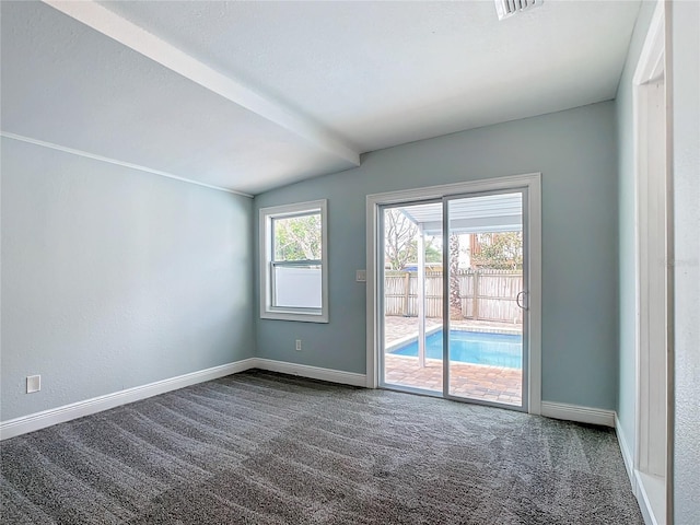 carpeted spare room with lofted ceiling and a wealth of natural light