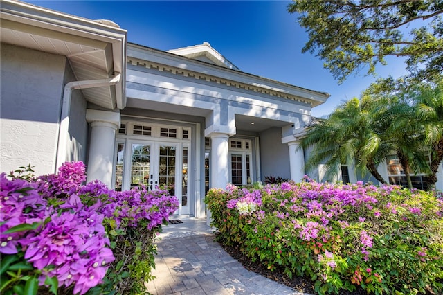 entrance to property featuring french doors