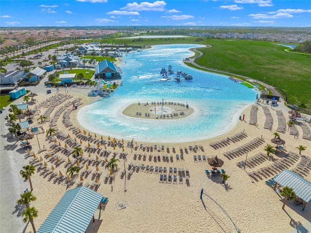 aerial view with a view of the beach and a water view