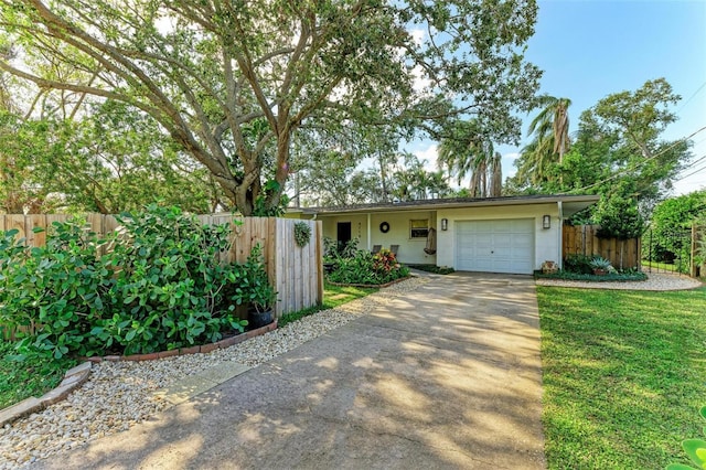 single story home with a garage