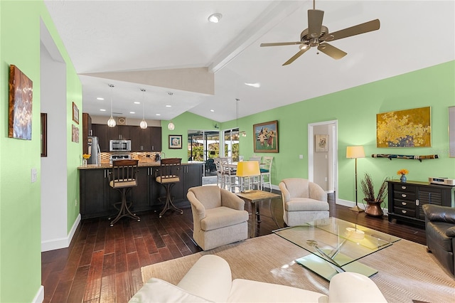 living room featuring dark hardwood / wood-style flooring, vaulted ceiling with beams, and ceiling fan