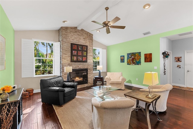 living room featuring vaulted ceiling with beams, ceiling fan, wood-type flooring, and a fireplace