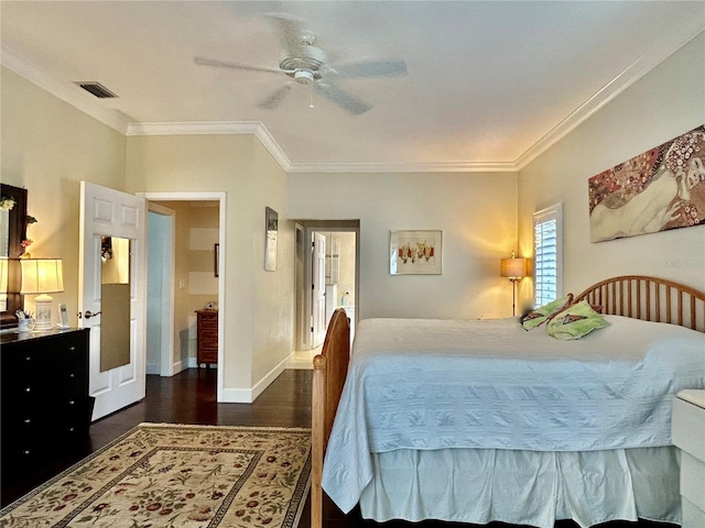 bedroom with dark hardwood / wood-style flooring, ceiling fan, and ornamental molding