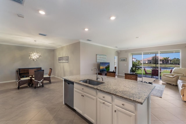 kitchen with sink, a kitchen island with sink, light stone countertops, white cabinets, and stainless steel dishwasher