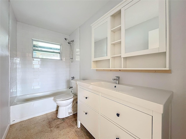 full bathroom featuring vanity, tiled shower / bath combo, and toilet