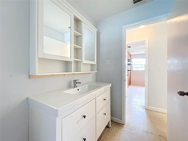 2877 Michigan St, Sarasota, FL 34237 - bathroom with baseboards and vanity