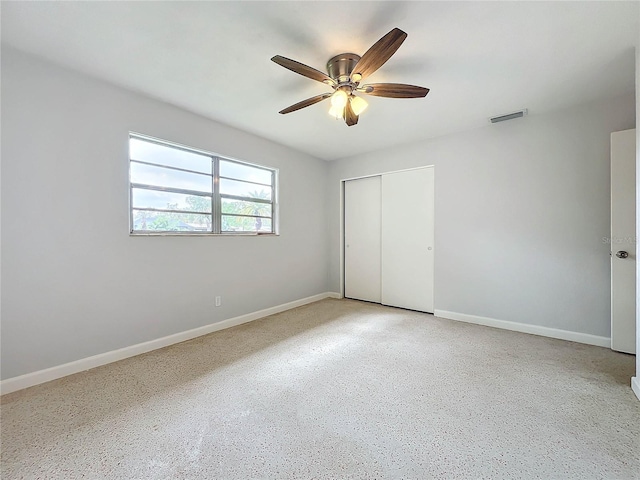 2877 Michigan St, Sarasota, FL 34237 - unfurnished bedroom with a closet, baseboards, and ceiling fan