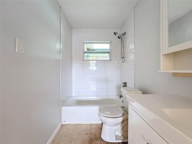 2877 Michigan St, Sarasota, FL 34237 - full bath featuring toilet, vanity, shower / bath combination, speckle patterned floor, and baseboards