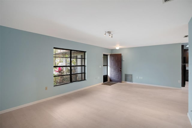 unfurnished room featuring light hardwood / wood-style flooring