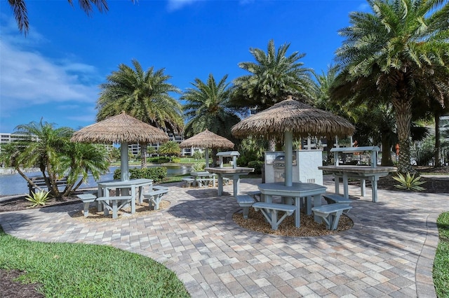 view of patio with a water view