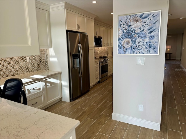 5760 Midnight Pass Rd Unit 307D, Sarasota, FL 34242 - kitchen with appliances with stainless steel finishes, wood tiled floors, light stone counters, recessed lighting, and backsplash