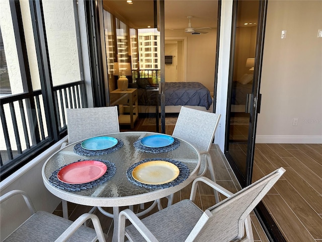 5760 Midnight Pass Rd Unit 307D, Sarasota, FL 34242 - balcony featuring outdoor dining area and ceiling fan