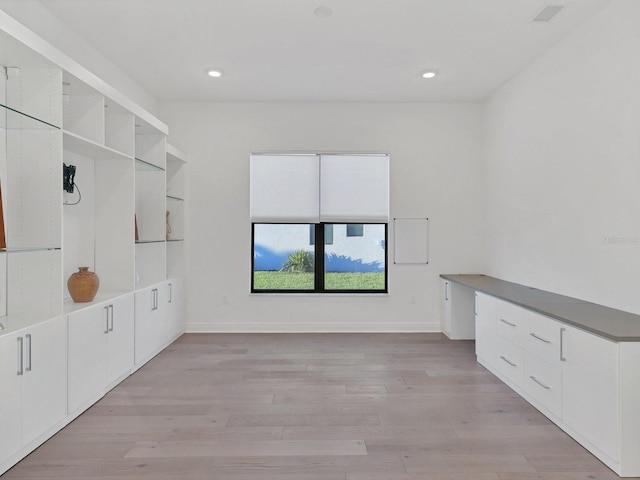 5058 Surfside Cir, Lakewood Ranch, FL 34211 - mudroom with light wood-style floors and recessed lighting
