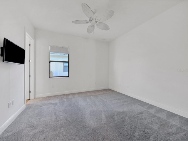 5058 Surfside Cir, Lakewood Ranch, FL 34211 - spare room with a ceiling fan and carpet flooring