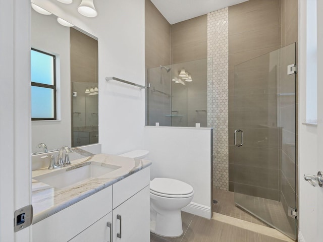 5058 Surfside Cir, Lakewood Ranch, FL 34211 - bathroom with vanity and a shower stall