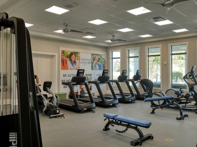 gym with visible vents and a drop ceiling