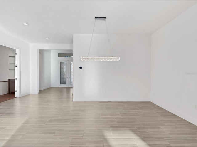 5058 Surfside Cir, Lakewood Ranch, FL 34211 - unfurnished room with recessed lighting and light wood-type flooring