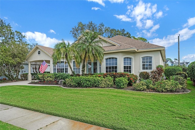 view of front of home featuring a front lawn