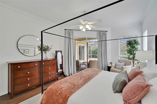 bedroom featuring hardwood / wood-style flooring, ceiling fan, and ornamental molding