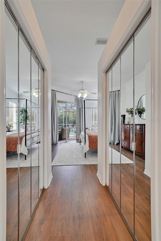 hallway featuring hardwood / wood-style floors