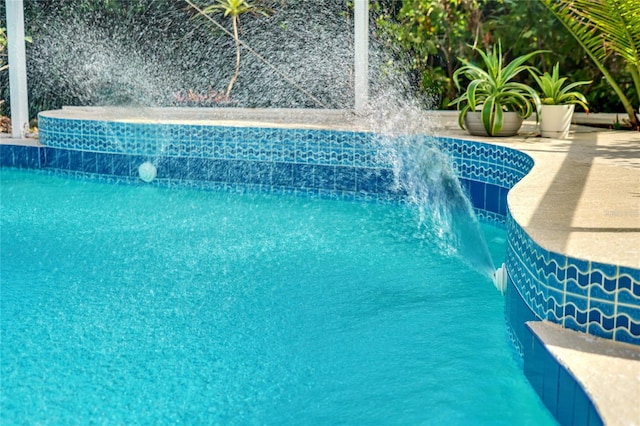 view of pool featuring pool water feature