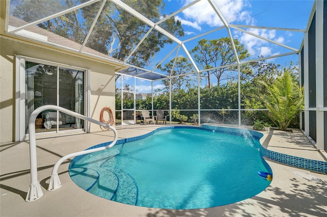 view of pool featuring a patio and a lanai