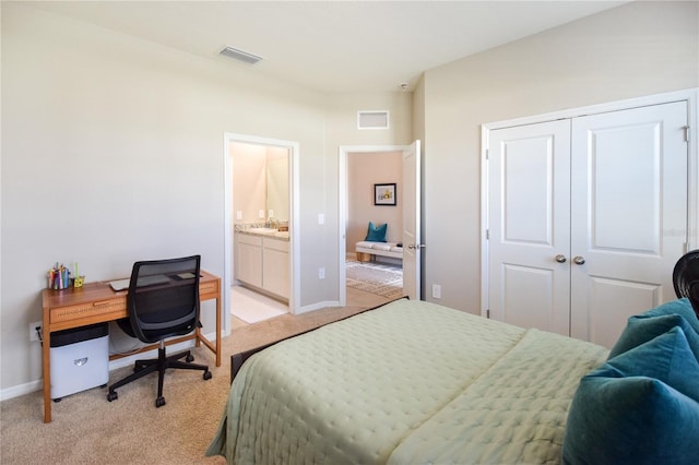 16926 Harvest Moon Way, Bradenton, FL 34211 - bedroom with light colored carpet, a closet, an office area, and baseboards