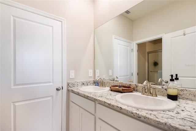 16926 Harvest Moon Way, Bradenton, FL 34211 - full bath with double vanity and a shower with door