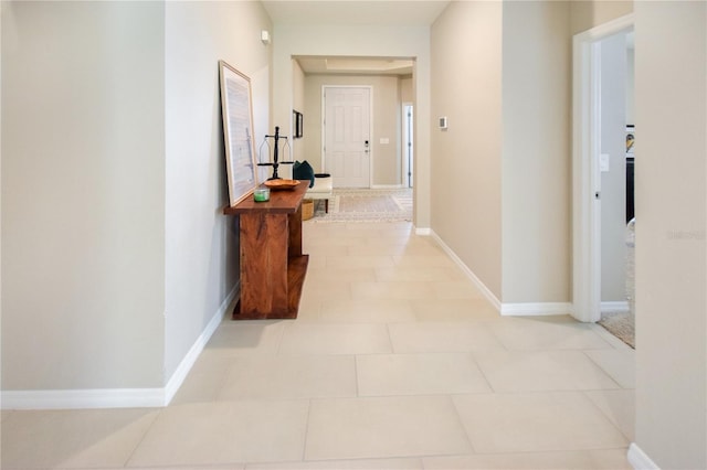 16926 Harvest Moon Way, Bradenton, FL 34211 - hall featuring baseboards and light tile patterned floors