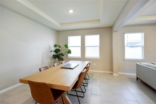 16926 Harvest Moon Way, Bradenton, FL 34211 - dining room featuring a raised ceiling, baseboards, and recessed lighting