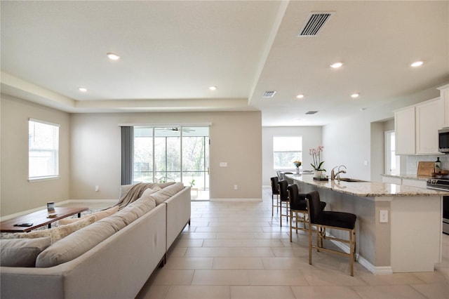 16926 Harvest Moon Way, Bradenton, FL 34211 - living area with baseboards and recessed lighting
