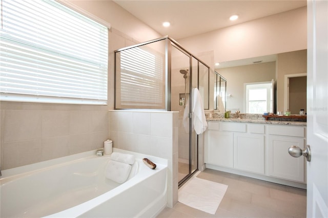 16926 Harvest Moon Way, Bradenton, FL 34211 - full bath with vanity, a bath, and a shower stall